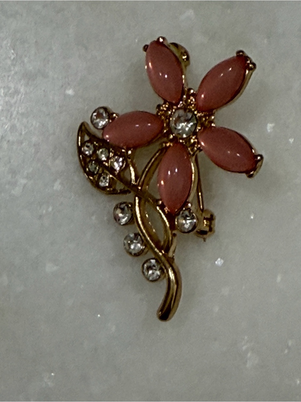Gold Floral Brooch with Pink Petals and Crystal Accents